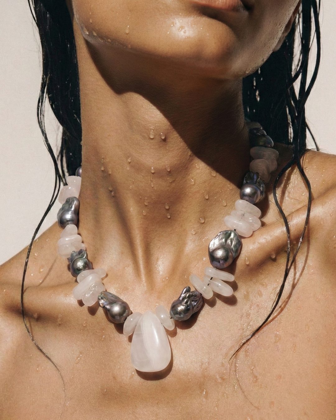 Alís pearl and quartz necklace worn — on display at VIBE Beauty Studio, Limassol